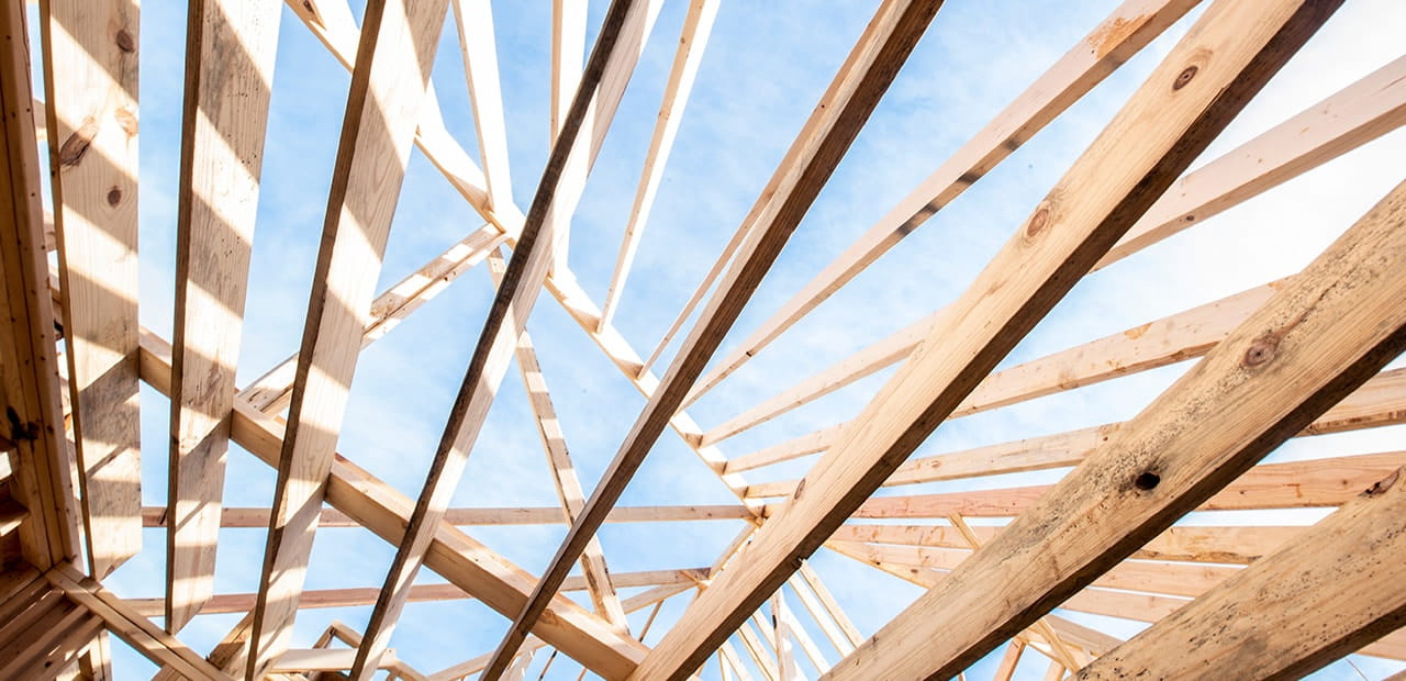 Close up from below of exposed house wooden frame