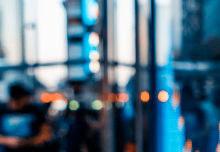Wall street sidewalk with screen ticker